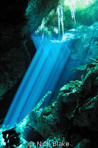 Cenote light refraction, Mexico by Nick Blake 